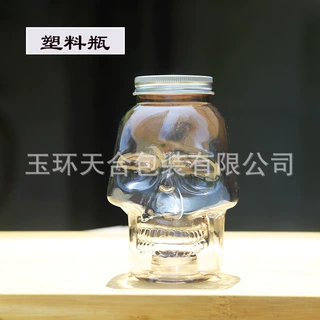 厂价直销800ml透明塑料大口径铝盖骷颅头瓶冷饮果汁一次性饮料瓶