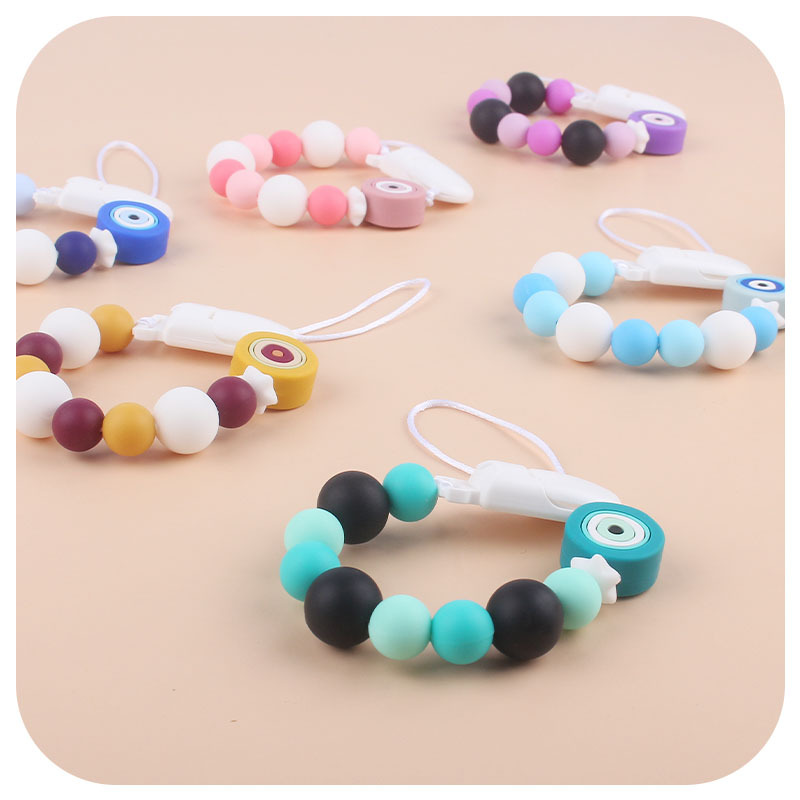Nueva Cadena de chupete de silicona ojos creativos de dibujos animados juguete de silicona perlas molares Cadena de chupete cadena anti-gota