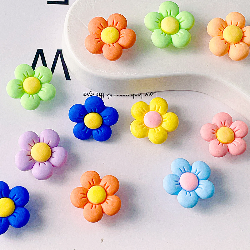 Nuevas series de flores de siete colores DIY accesorios de resina crema agujero de goma agujero de botón de zapato flores transparentes botón de zapato desmontable