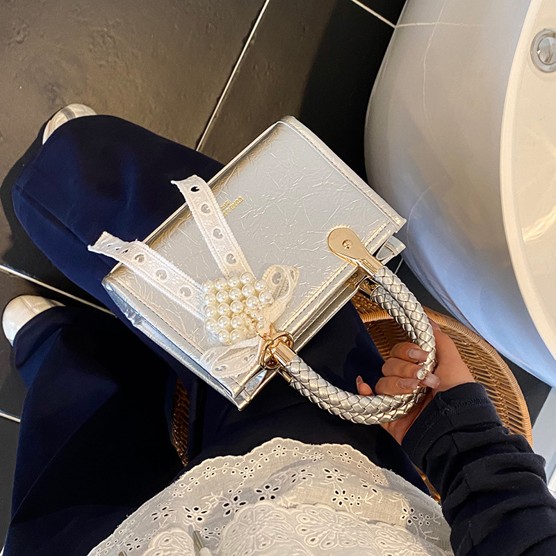 Bolso cuadrado pequeño portátil más vendido transfronterizo para mujer 2025 nuevo bolso de hombro de moda de nicho bolso de mensajero de alta gama