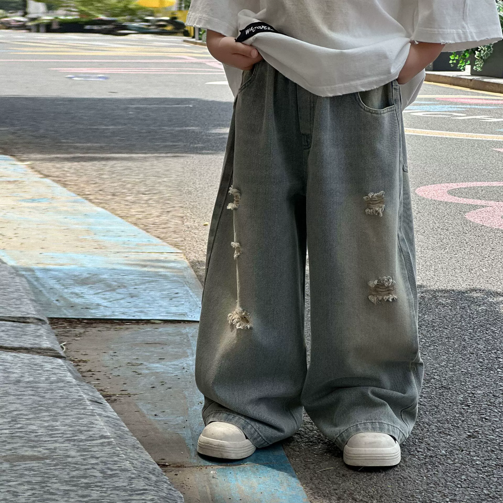 男童秋季韩版牛仔裤2025新款春秋儿童简潮水洗宽松阔做旧破洞腿裤