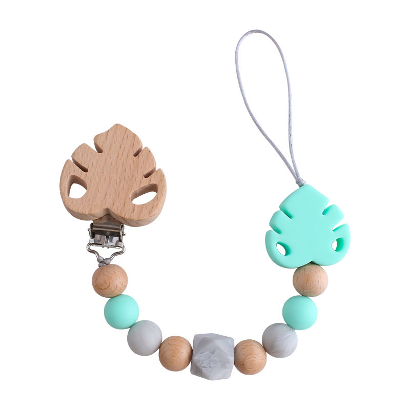 Suministros para bebés creativo clip de chupete de hoja de haya juguete mordedor bebé Cadena de chupete de hoja de silicona cadena anti-caída