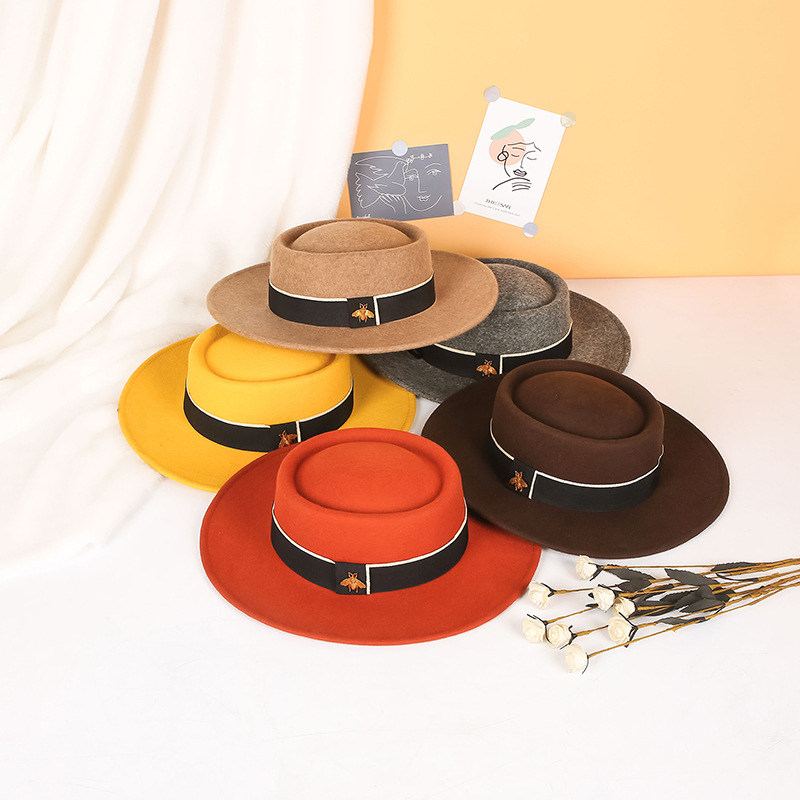 Sombrero de otoño e invierno lana pura cóncavo-cúpula convexa 8cm ala ancha sombrero de lana sombrero de fieltro de moda británica europea y americana al por mayor