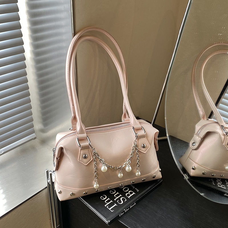 Dulce y fresco bolso de axila de chica caliente 2025 primavera y verano nuevo bolso femenino bolso de alta calidad bolso de hombro con remaches personalizado marea