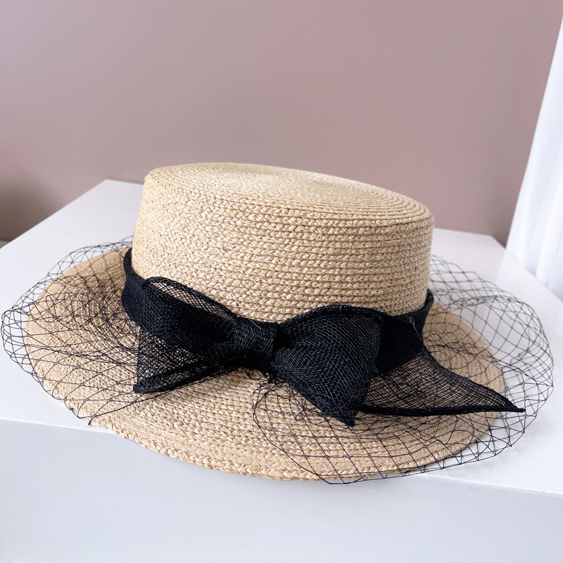 Cappello di paglia donna elegante hepburn in rafia con fiocco_voghion.com