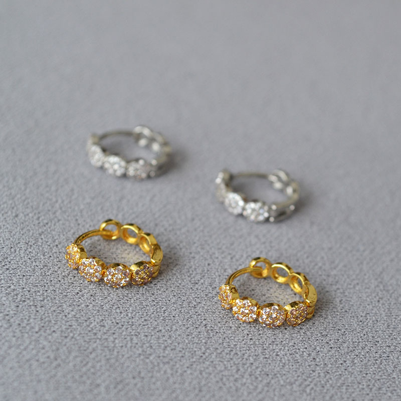 Small design fashionable sophisticated earrings, french style, simple and elegant design, diamond encrusted