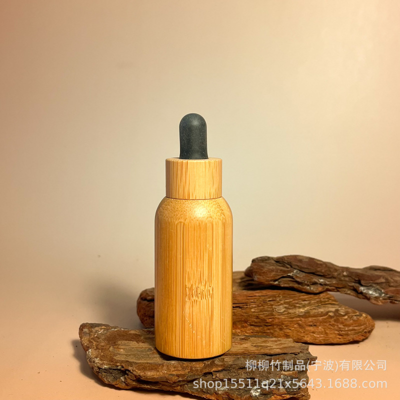竹のゴムの頭の点滴の瓶の精華の液体の携帯は瓶の竹の製の光を避ける精華を分けて瓶の竹の木を分けて瓶を詰めます|undefined