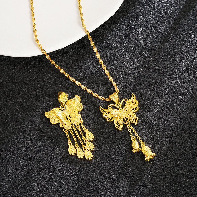 Tendencia nacional Vietnam Colgante de oro de arena Estilo de palacio Mariposa Colgante de borla de lirio de los valles Estilo chino Joyería de alta gama de todo fósforo