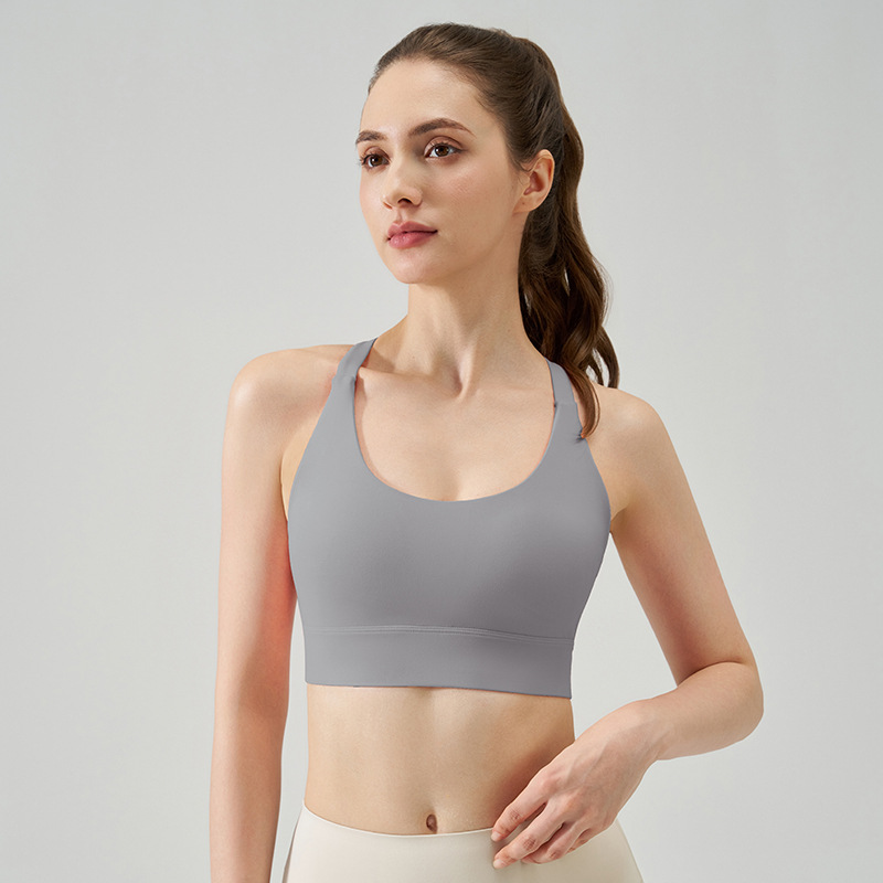 Primavera y verano nuevo estilo desnudo amortiguador sujetador deportivo mujer hueca hebilla hermosa espalda fitness yoga ropa interior correr alta intensidad