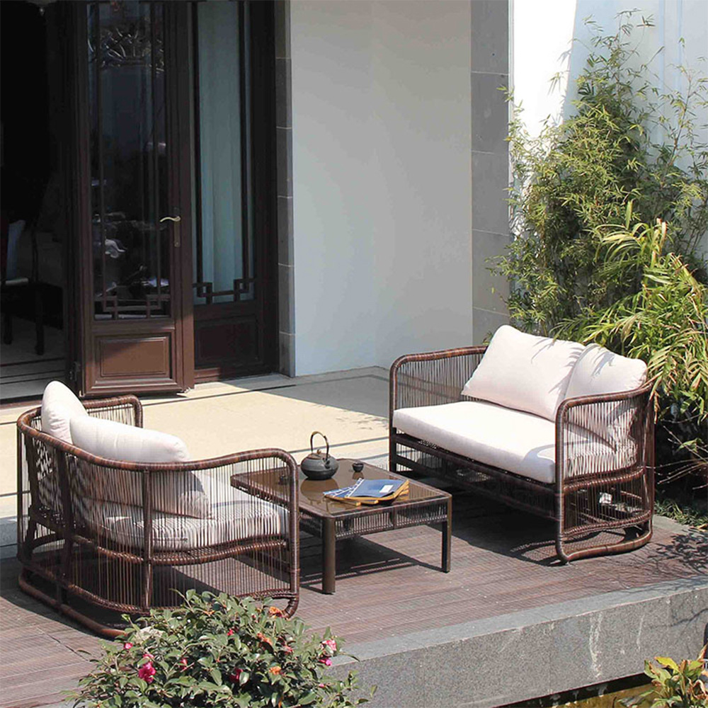 Outdoor rattan sofa set for courtyard, outdoor leisure terrace, and open-air rattan seating&mdash;single and double lounge chairs made from natural rattan.