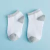Blended naked gray and white ship socks