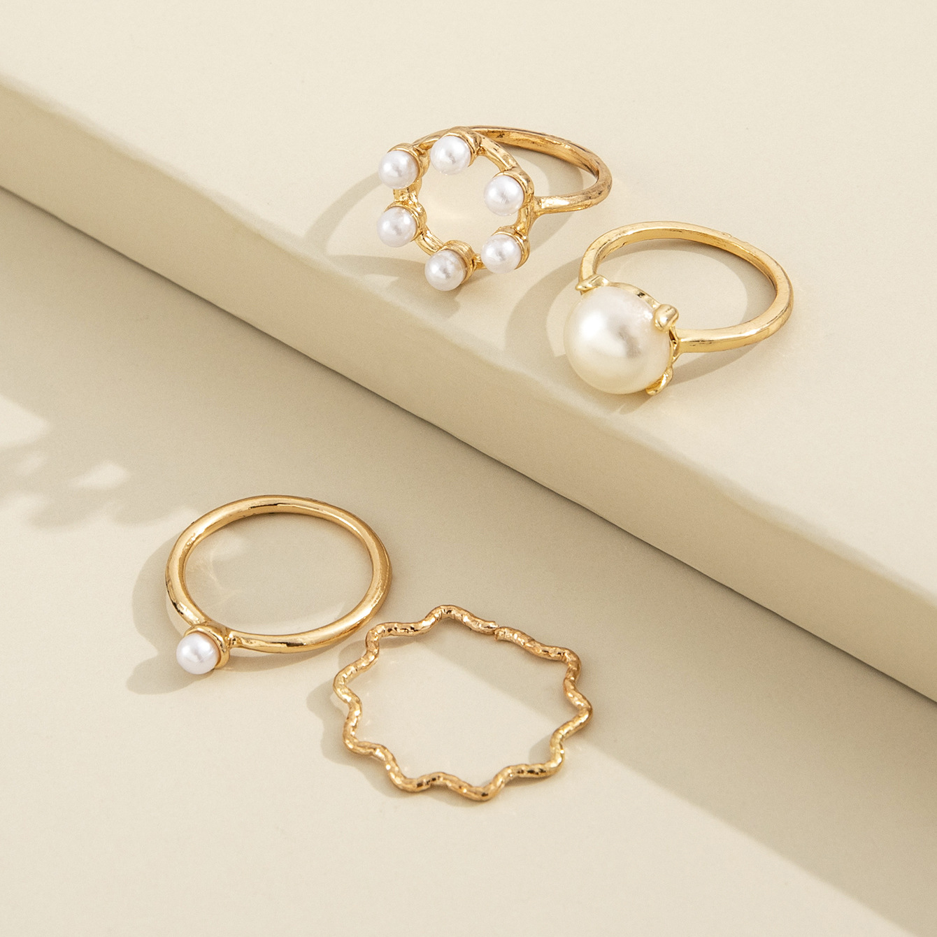 Europe And America Cross Border New Graceful And Fashionable Circle And Pearl Wave Simple Geometric Knuckle Ring Four-piece Set display picture 3