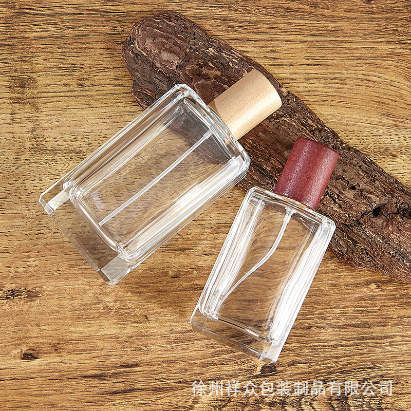Fabricantes mayoristas de botellas de perfume de alta gama, botellas de spray cuadradas transparentes, tapas de vidrio, muestras portátiles de 30 - 100 ml