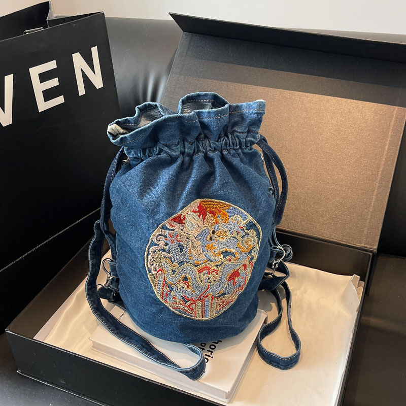 2024 nueva mochila bordada de estilo chino bolso de hombro de mezclilla casual transfronterizo bolso de mensajero personalizado bolso de cubo