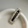 Polka dot rectangle [white]