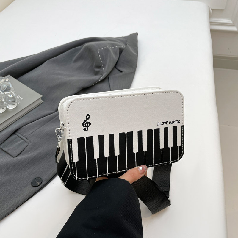 2025 invierno nueva moda color contraste pequeño bolso cuadrado niña dulce personalidad piano notas pequeñas bolso femenino portátil