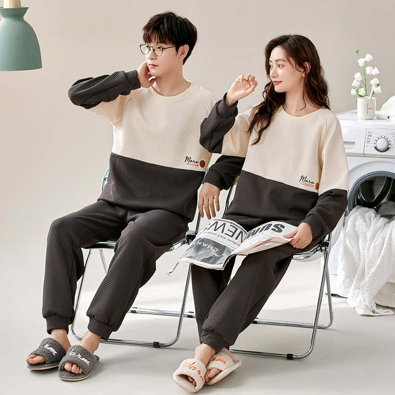 El otoño y el invierno sándwich de manga larga pareja pijamas engrosada de dibujos animados cuello redondo jersey de los hombres y las mujeres de ropa de casa caliente se puede usar fuera