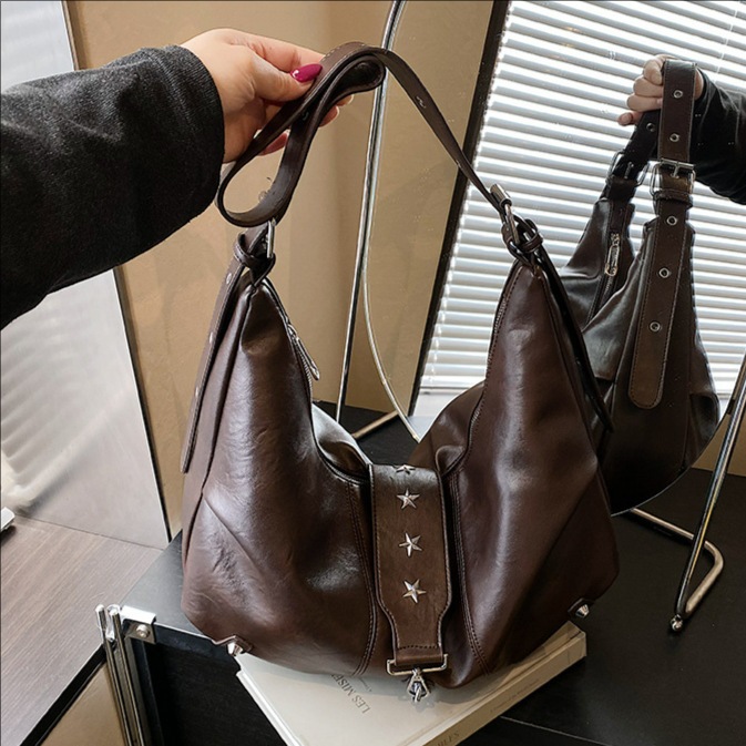 Bolsas de bolsillo transfronterizas para mujeres otoño-invierno 2025 nuevo ocio versátil bolsas de hombro de brazo de gran capacidad retro mochila