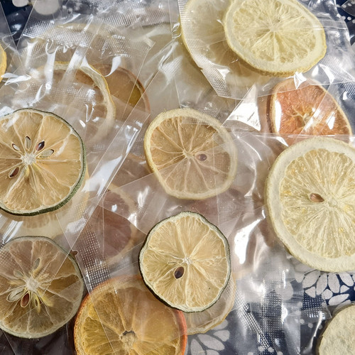 Wholesale Orange Slices/Orange Chips, Dried Orange in Individual Small Bags—Factory Direct, Bulk Orders Welcome with Special Discounts on Lemons Slices in Small Bags