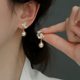 High-grade champagne pearl cat's eye stone butterfly earrings women's new niche design simple exquisite temperament earrings