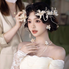 新型の超仙の花のフリンジヘアは森系の優雅な新婦の頭飾りの韓国式の結婚式の写真を飾って髪を飾ります。