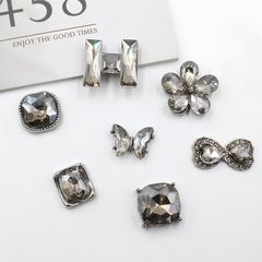 シンプルなファッションは、文字の花diy合金アクセサリーのアクセサリーを組み合わせて、透明なガラスのレトロな髪飾り材料を追加します