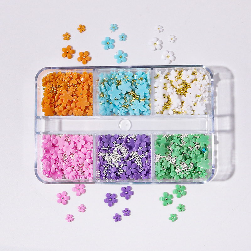 Set de joyas de manicuría de cinco pétalos colorido parches de uñas de flores tridimensionales DIY nail decoración taladro plano al por mayor