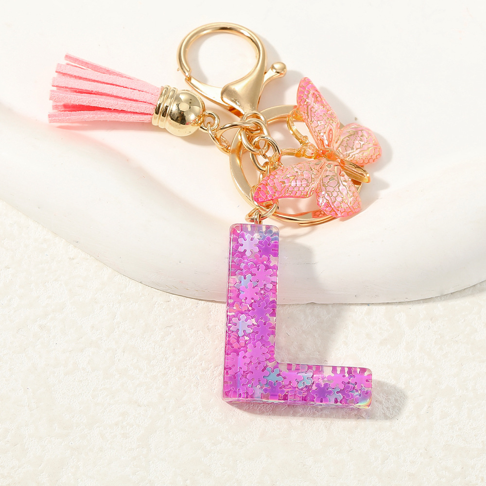 Nuevo color púrpura claro mezcla de polvo brillante letras inglesas resina llave colgante estilo simple mariposa borda colgante