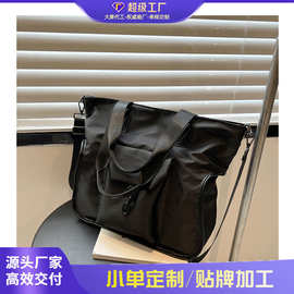 跨境尼龙大容量女包2026新款质感百搭学生上课托特包简约纯斜挎包