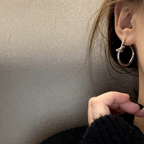 Brand earrings with tassels