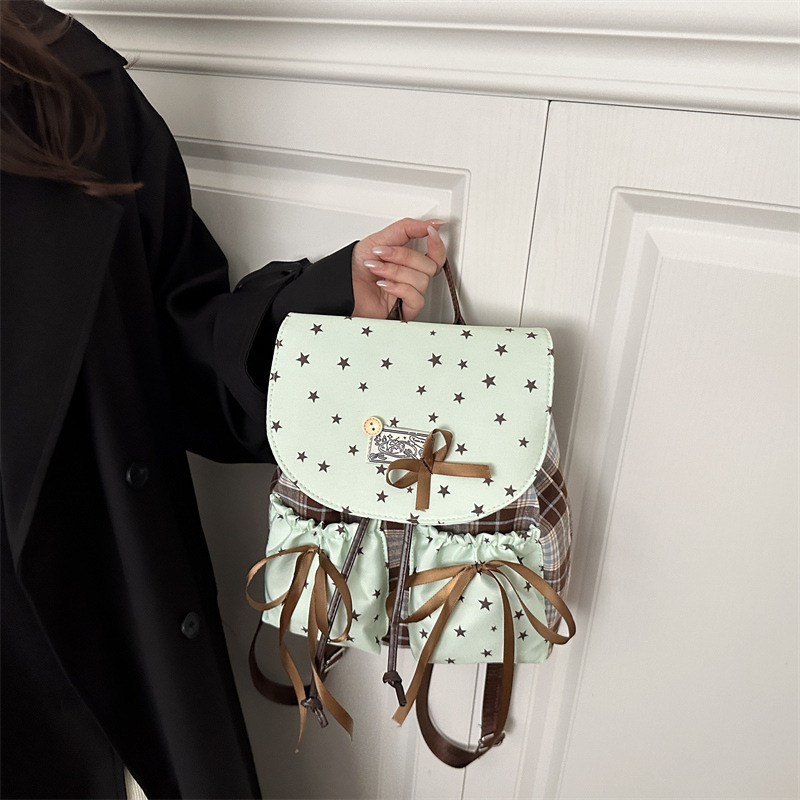 Arco ondulado coreano ins estilo extranjero mochila multifuncional dulce para estudiantes en clase mochila universal
