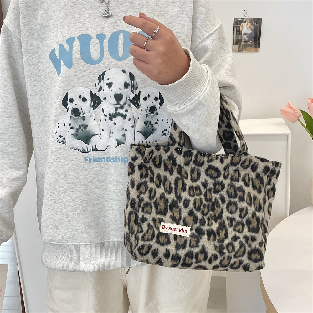 311021 Simple ins retro style woolen multi-color handbag for women, 2023 new checkered autumn and winter women's bag undefined