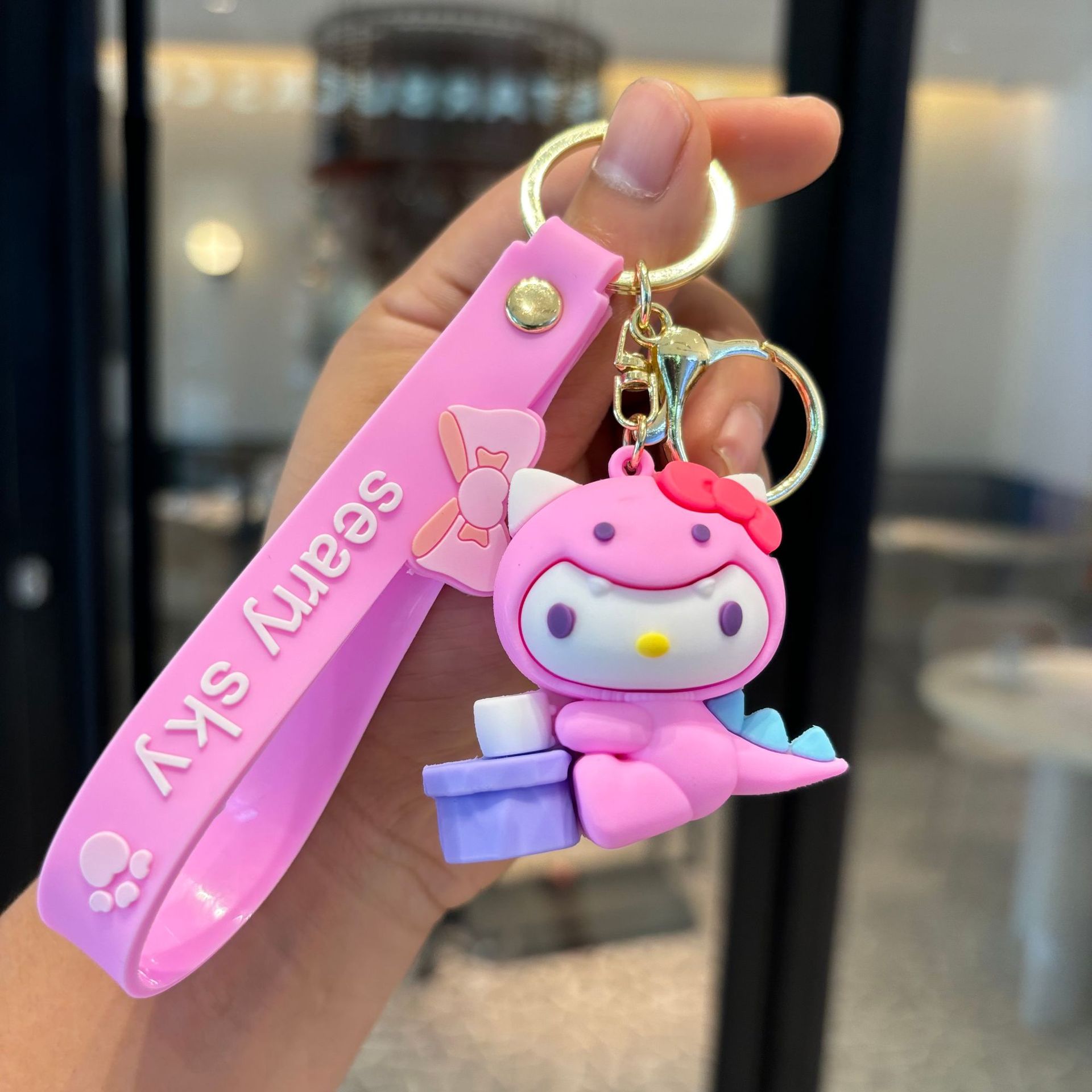 Caricatura Sanrio llavero colgante de muñeca Kulomi bolso de coche llavero muñeca máquina pequeña regalo al por mayor