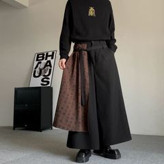 夏の山本耀司の新しい中国式の書道のスカートのズボンの大きいサイズは偽の2つの広腿のズボンの小さい大衆の設計感のズボンをつなぎ合わせます。