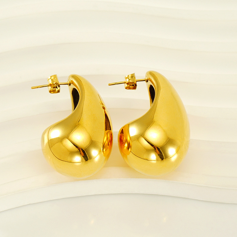 Diseño de alta gama sentido 18K oro gordito gota de agua pendientes de acero de titanio INS moda femenina todo partido pendientes geométricos al por mayor