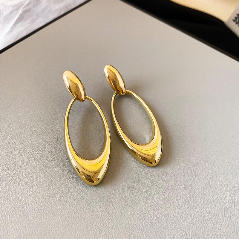 Pendientes de borla de flor de metal con aguja de plata Pendientes de temperamento de moda Pendientes exagerados de nicho europeo y americano