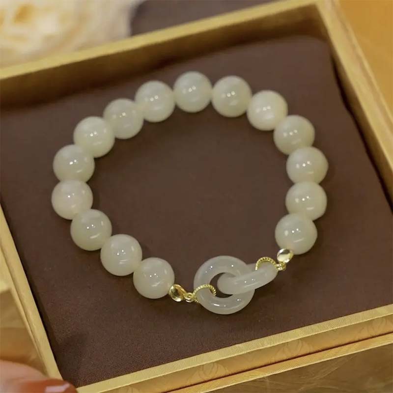 Elegant, retro-style women's bracelet with interlocking "Guofeng" motifs—perfectly versatile and exuding a luxurious, understated charm. A chic, easy-to-match accessory for besties!