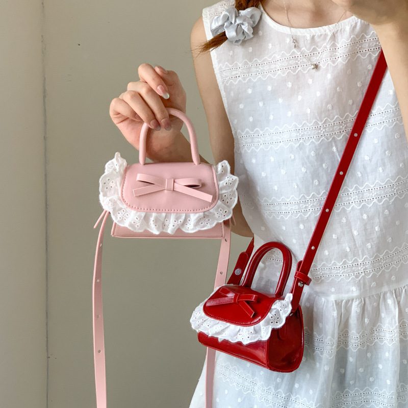 Mini bolso para mujeres nuevo lindo arco PU inclinado a través de bolsos pequeños bolsos de lápiz labial para niñas accesorios bolsos de moda para niños