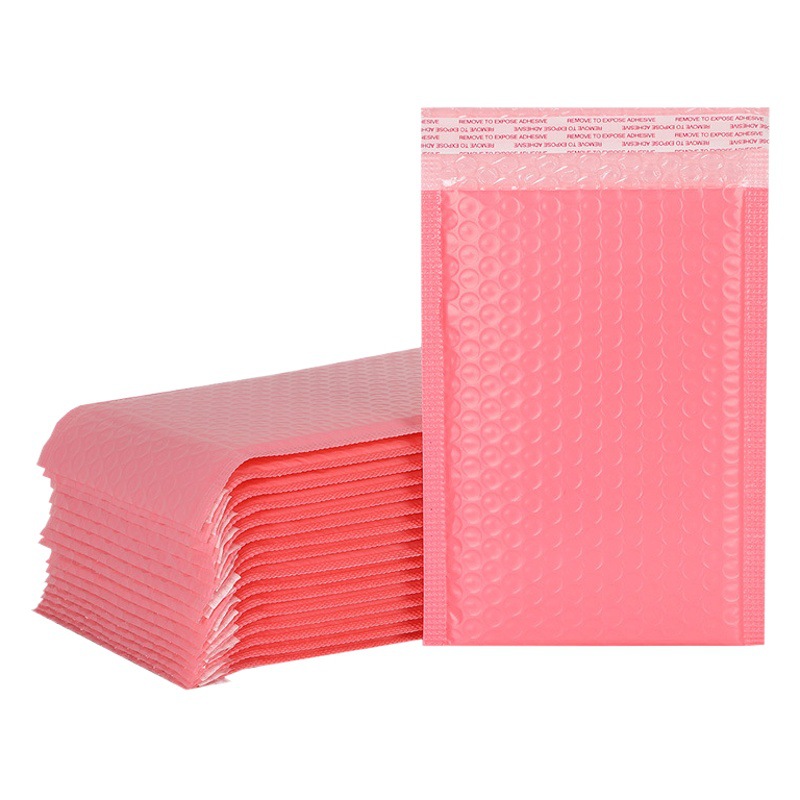 Bolsa de burbujas de película de coextrusión rosa Bolsa de embalaje de logística de ropa al por mayor Bolsa de embalaje exprés engrosada Bolsa de espuma Bolsa autoadhesiva