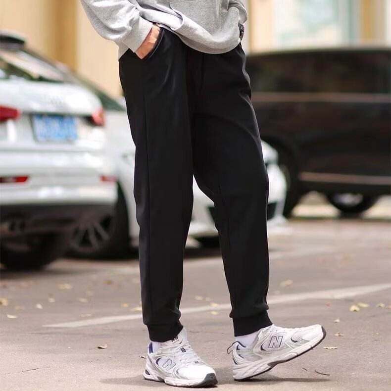 Pantalones a prueba de viento para hombres otoño e invierno seis pantalones de tela de prevención con pantalones de algodón caliente de terciero pantalones casuales delgados ropa de trabajo larga coreana