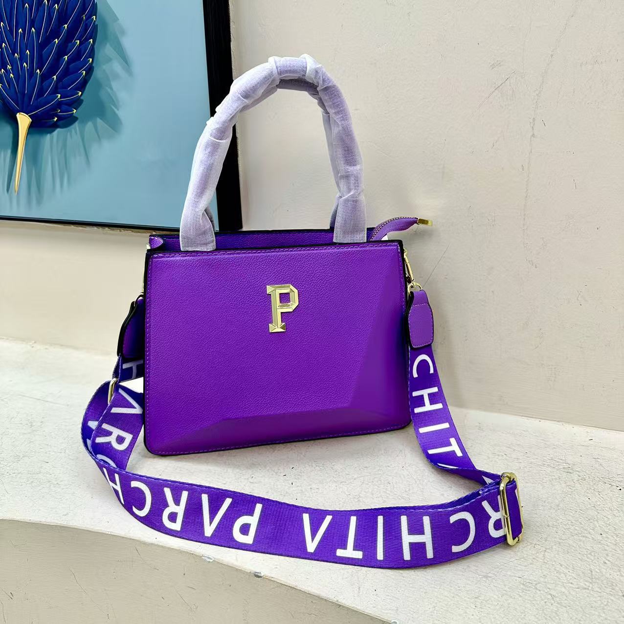 Bolsos transfronterizos para mujer 2025 primavera nuevo estilo bordado alfabeto Bolsos tote moda europea y americana bandolera de un solo hombro