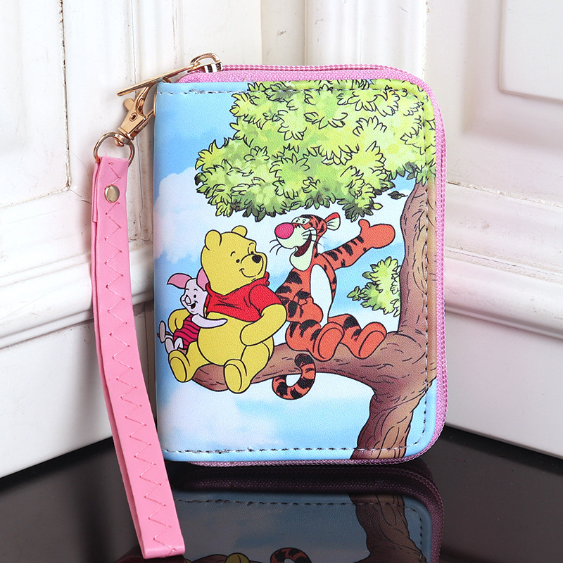 Winnie the pooh pig and tiger on the branch