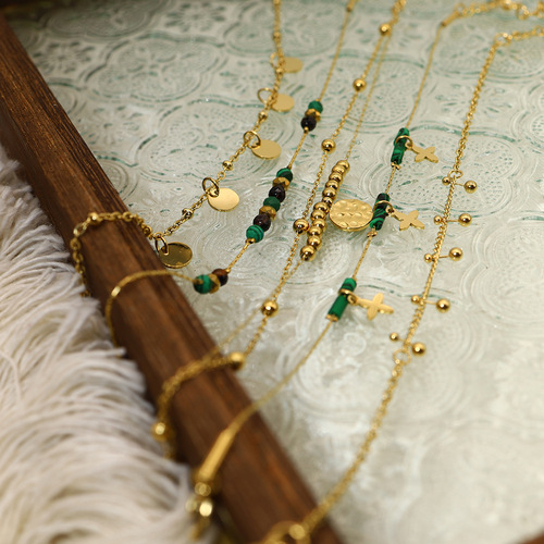 European and American retro natural stone beaded titanium steel bracelet light luxury four-leaf flower disc fashion middle-aged malachite women's hand jewelry