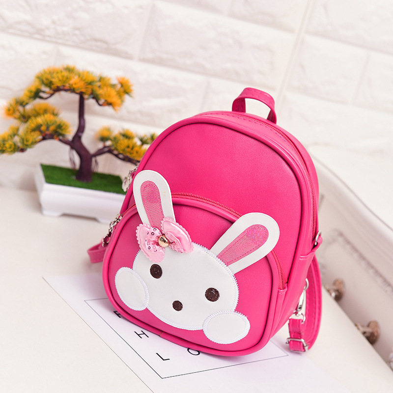 Versión coreana para niños de moda mini mochila princesa niña linda mochila de cuero jardín de infantes dibujos animados salida pequeña mochila escolar