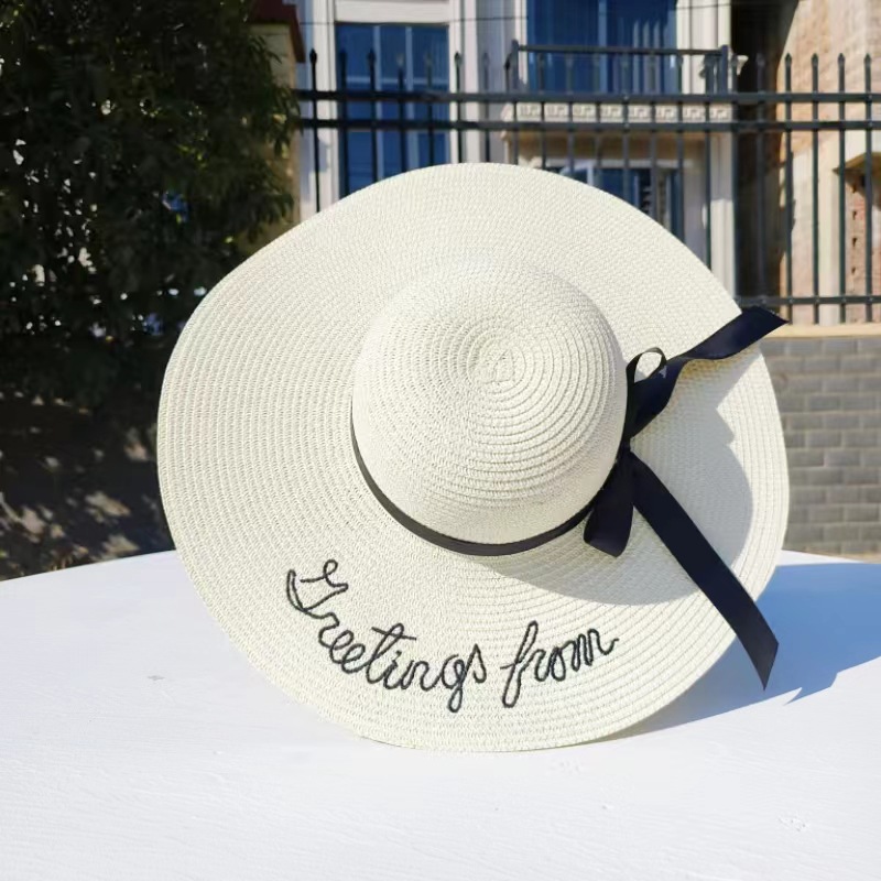 Women's Casual Simple Style Letter Daisy Embroidery Wide Eaves Straw Hat display picture 5