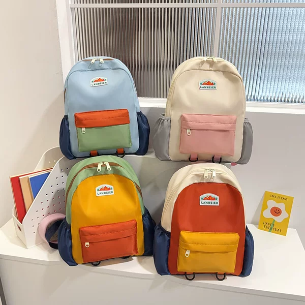 Japanese-style ultra-light children's backpack, new model 2026, high aesthetic appeal, large capacity, color-blocking, suitable for boys and girls, for outdoor use and school