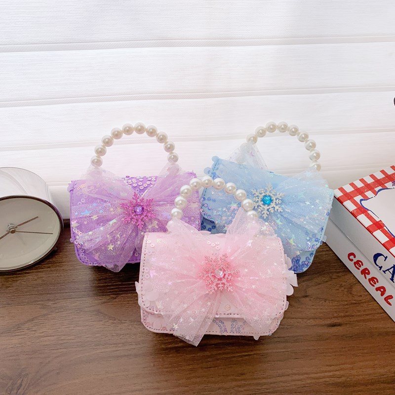 Bagos de perlas para niños 2025 nuevos bolsos de niños bolsos de mochila de niñas bolsos accesorios de princesa bolsos de viento de fragancia