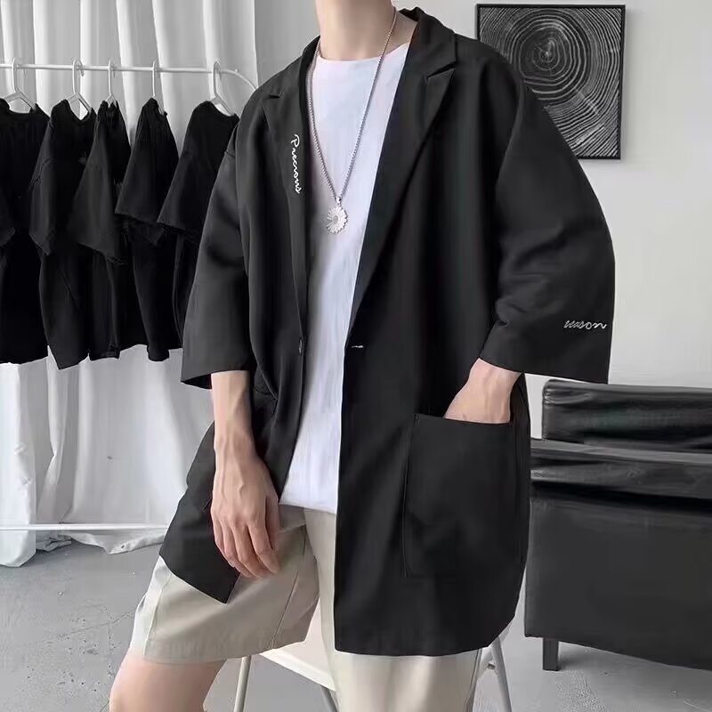 カジュアルスーツの男性の夏の薄いデザイン感の上着のデザイン感は街のデブの大きいサイズの7分の袖のコートのスーツを揚げます。