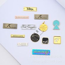 厂家直售带孔锌合金缝线标  压铸电镀可定logo鞋服袜子商标铭牌