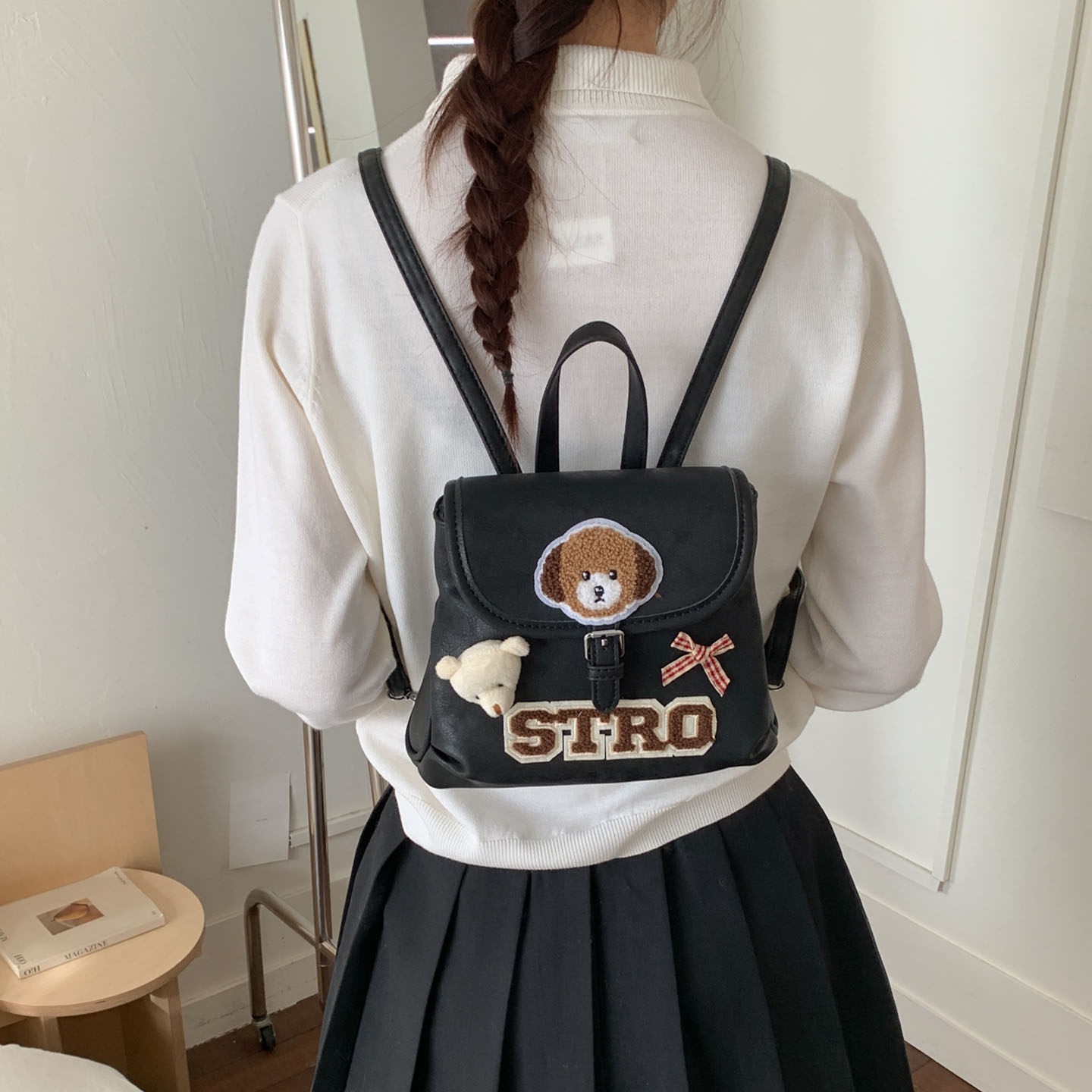 Tide retro nuevo 2026 cachorro nicho de dibujos animados femeninos, mochila coreana, mochila encantadora de moda para viajar